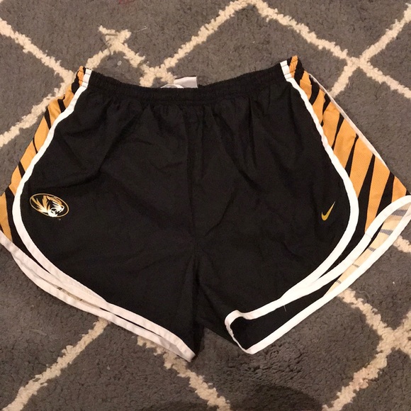 gold nike shorts womens